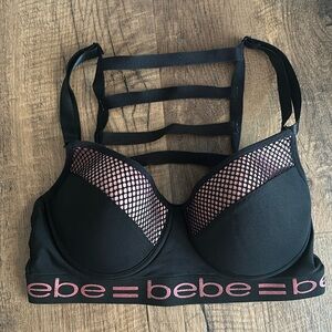 Bebe bra size medium with underwire black/pink straps